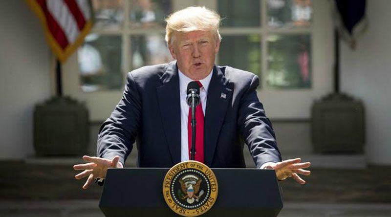 Foto: Donald Trump saat mengumumkan hengkangnya AS dari Kesepakatan Paris di Gedung Putih (1/6/) (AP Photo/Andrew Harnik)