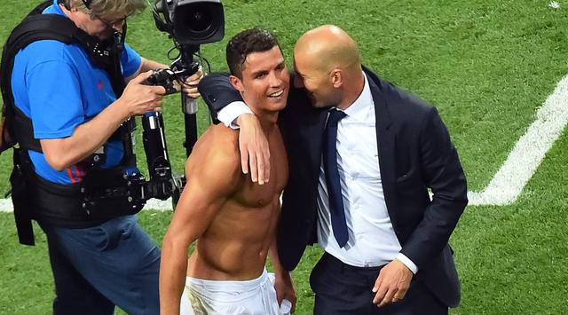 Cristiano Ronaldo (kiri) dan Zinedine Zidane. GIUSEPPE CACACE / AFP