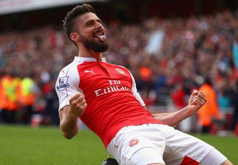 Foto: Olivier Giroud ingin angkat kaki dari Arsenal.