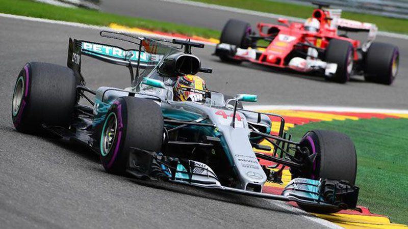 Lewis Hamilton menang di GP Singapura. (AFP PHOTO / Emmanuel DUNAND)