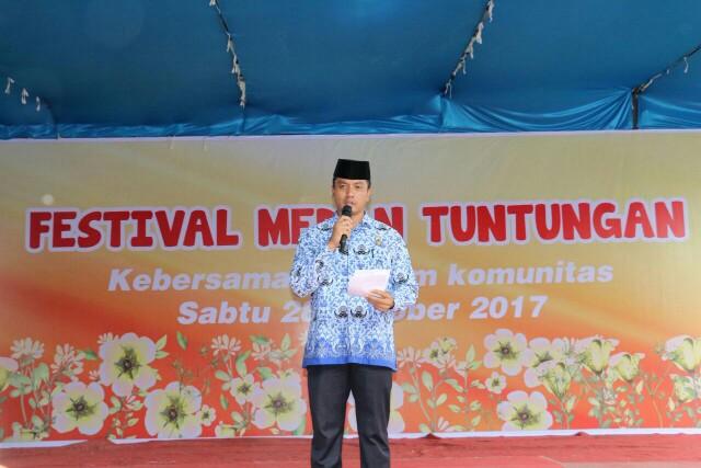 Foto: Camat Medan Tuntungan Gelora KP Ginting S.STP membuka secara resmi Festival Rakyat yang digelar Internasional Organization Of Migration (IOM) bekerja sama dengan Kecamatan Medan Tuntungan di Halaman STMIK Nauman, Jalan Jamin Ginting, Sabtu (28/10).