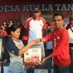 Jalan Sehat Kuala Tanjung, IPKTB dan Pemdes Tampil dengan Jiwa Patriotis