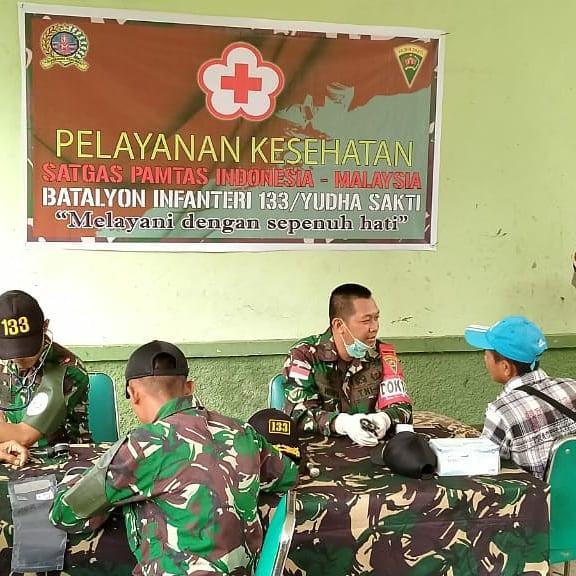 Hari Juang Kartika, Satgas Pamtas Yonif 133/YS Berikan Pengobatan Gratis