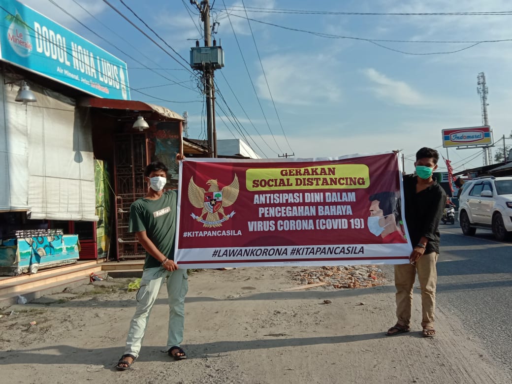Antisipasi Corona, Pemuda Sergai Bagikan Masker dan Sosialisasi dengan Warga