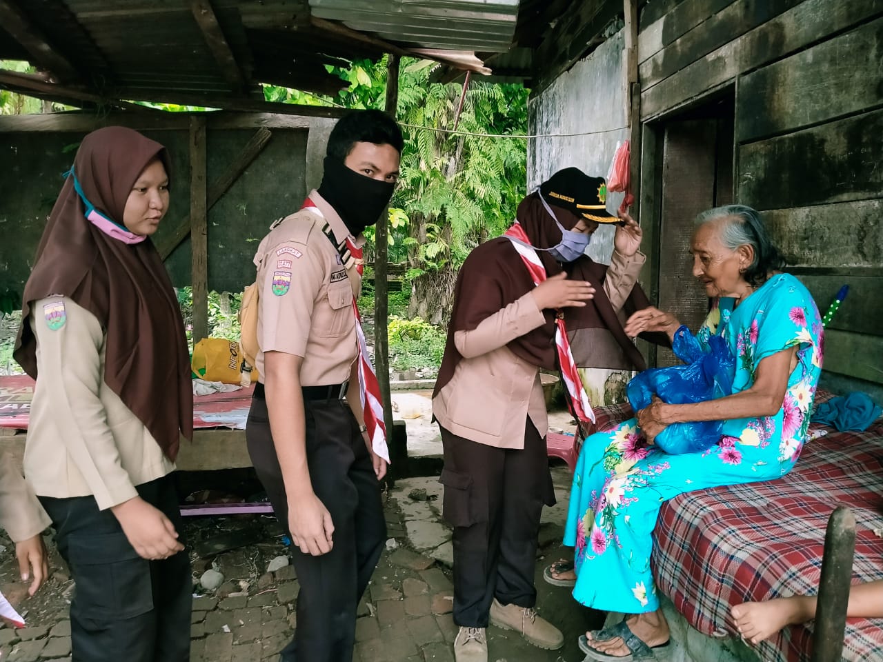 Gerakan Pramuka Kwarcab dan DKC Langkat, Gelar Baksos Bertajuk #LebaranPakaiMasker