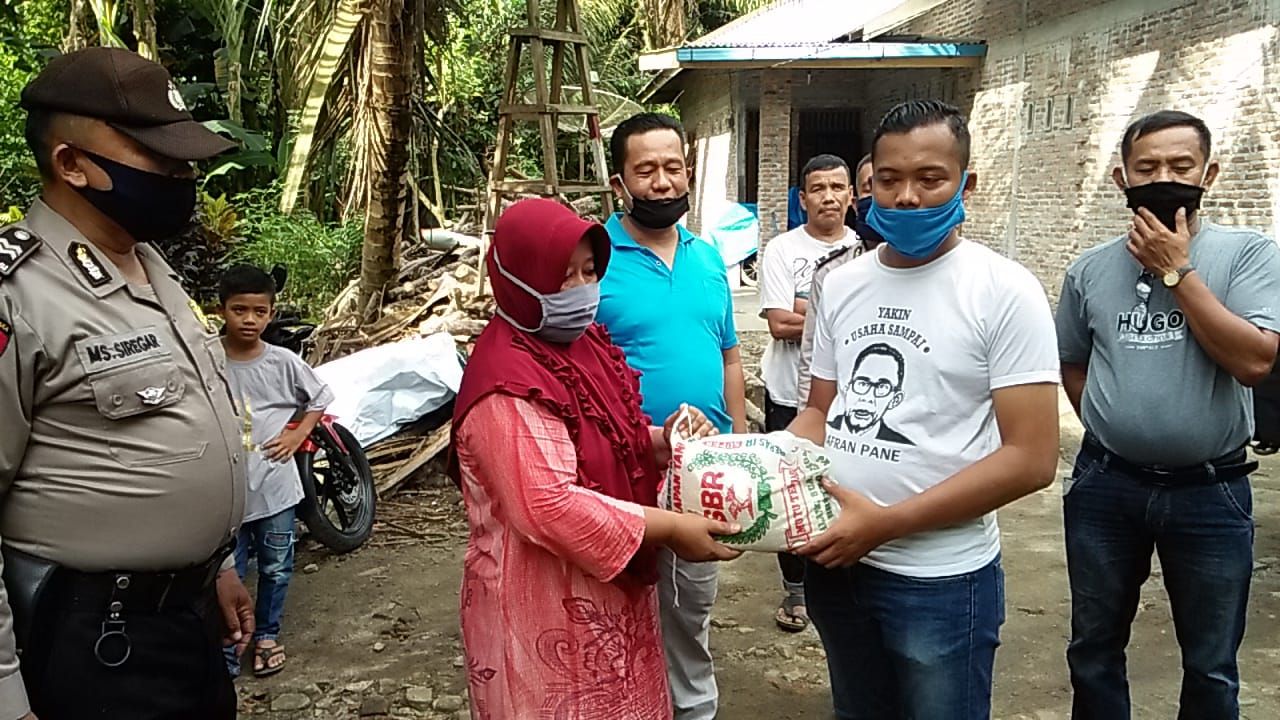 Berbagi Sembako, HMI Sumut dan Polres Asahan Sasar Desa Pulau Rakyat Tua