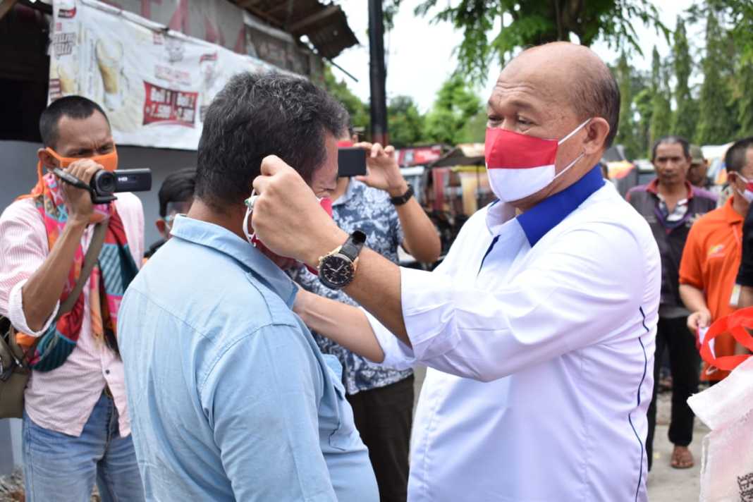 Sambut Dirgahayu RI, PTPN2 Bagikan 5 Ribu Masker ke Masyarakat