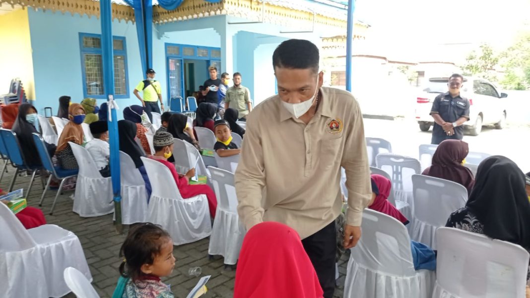Jelang HPN, PWI Langkat Bagi Masker serta Santuni Anak Yatim dan Dhuafa