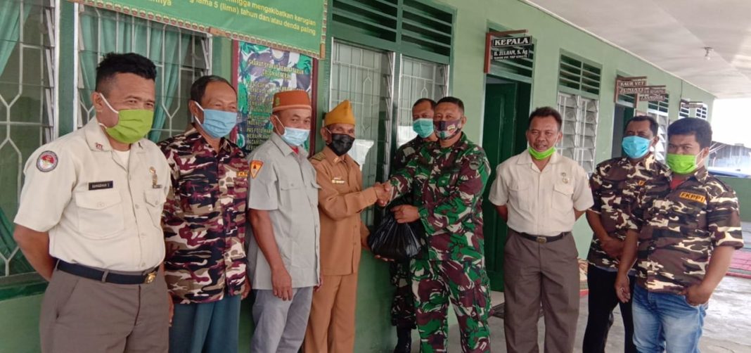 Babinminvetcaddam I/BB Diwakili Kakanminvetcad 1/18 Tanah Karo Berbagi Kasih dengan LVRI Tanah Karo