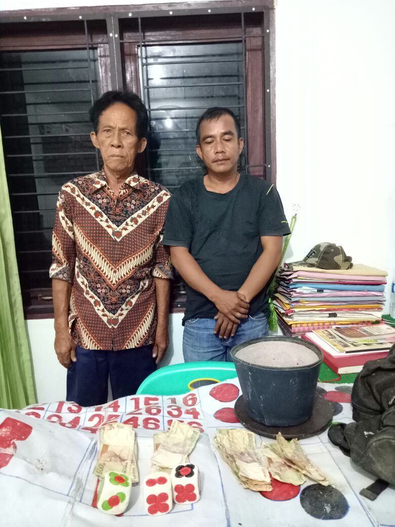 dua warga Lima Puluh di tangkap karena membuka judi dadu kopyok