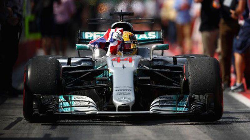 Lewis Hamilton merebut pole kelimanya di GP Inggris. (Clive Mason/Getty Images/AFP)
