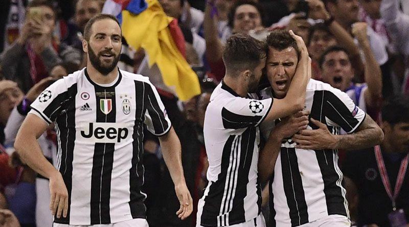 Pemain Juventus rayakan gol Mario Mandzukic ke gawang Real Madrid (Javier SORIANO / AFP)