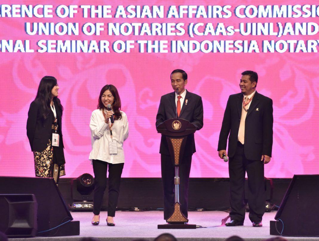 Foto: Presiden Jokowi saat menghadiri Seminar Internasional Ikatan Notaris Indonesia, di Bali Nusa Dua Convention Center, Bali, Jumat (8/9).