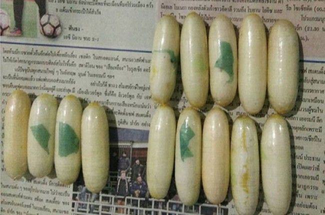 Kapsul-kapsul narkoba dikeluarkan dari perut Paulo Nascimento. (Foto: Narcotics Suppression Bureau)