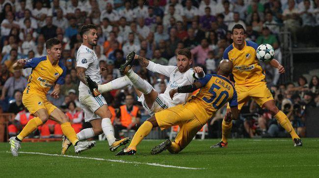 Sergio Ramos berhasil mencetak gol ke gawang APOEL lewat tendang salto.(REUTERS/Sergio Perez)